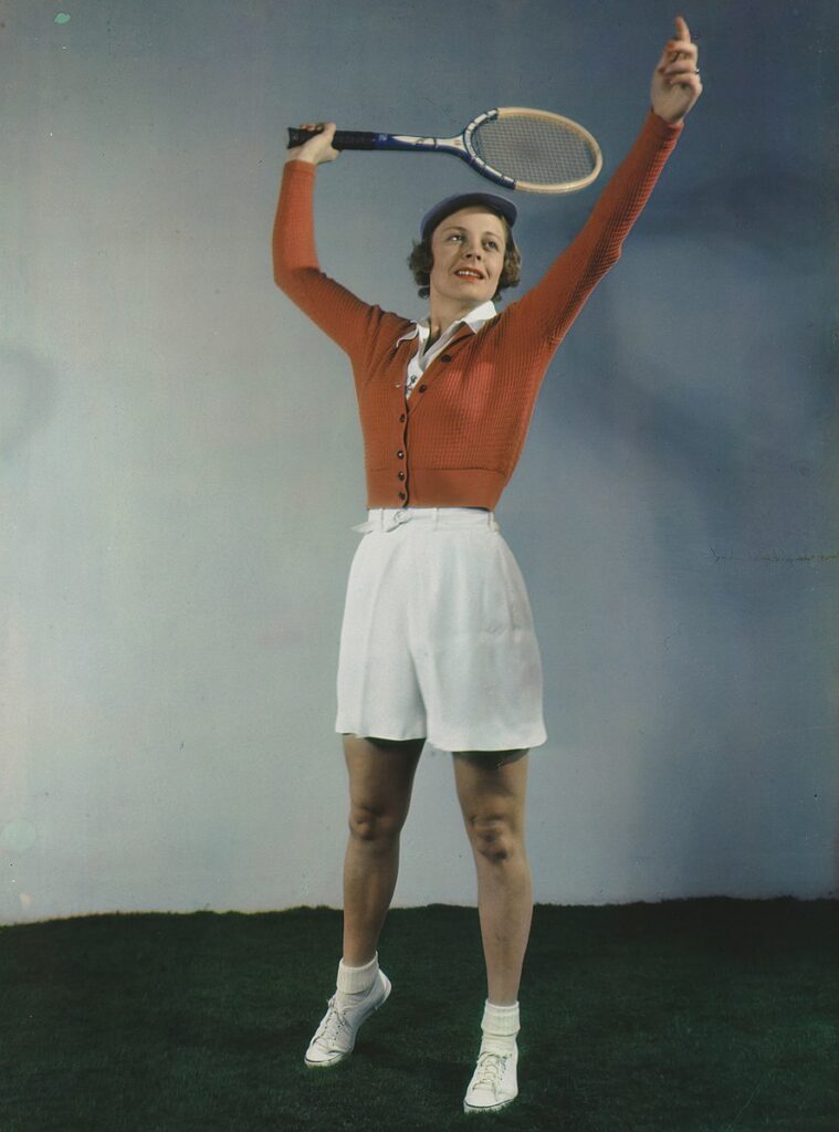 Alice Marble swinging tennis racquet